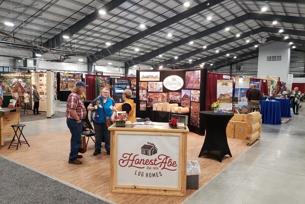 photo of tradeshow with Honest Abe Log Homes booth